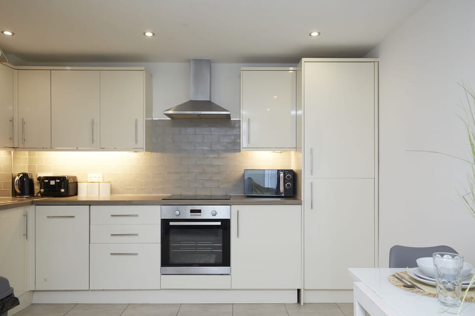 Fully equipped modern kitchen with everything you need for home-style cooking during your stay