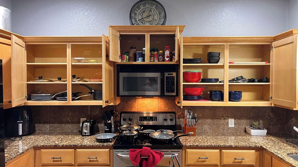 Kitchen Paradise: Cook up a storm in this well-equipped kitchen with stylish decor! Whether staying a week or a year, we've got everything you need to settle in!