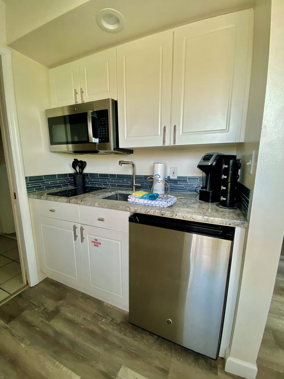 Kitchenette with induction stove top, microwave ,  coffee maker and mini fridge!