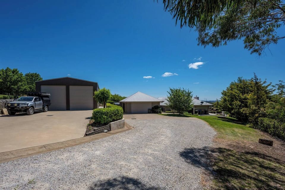 While the large shed at the front of the property is not accessible, there is a double garage and two parking spots in the driveway for your use.