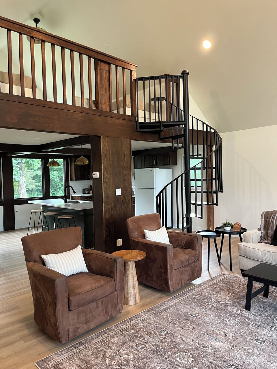 Spiral staircase leading to loft sleeping area