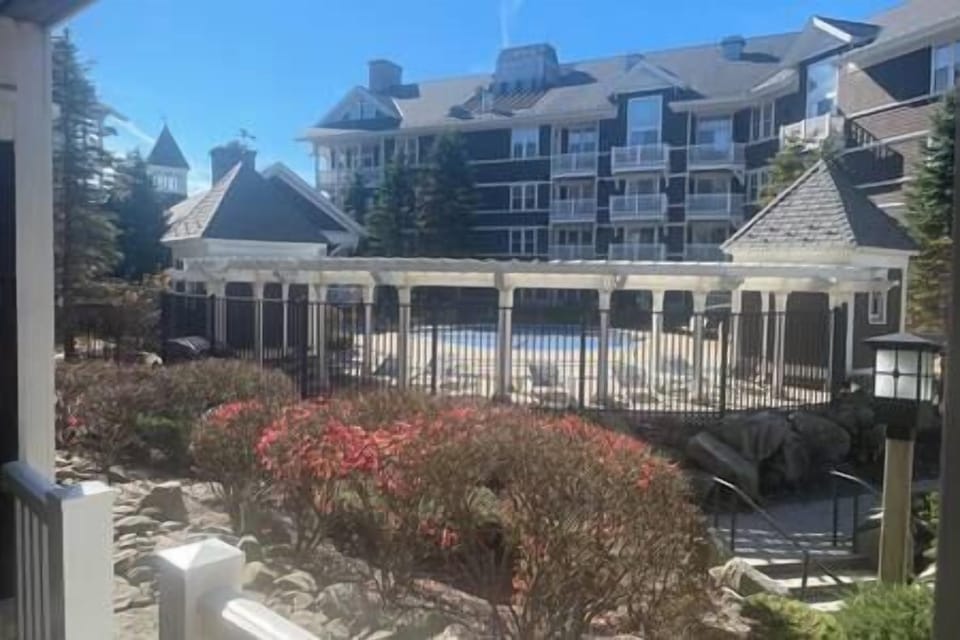 Steps from the heated pool/Hot Tubs
