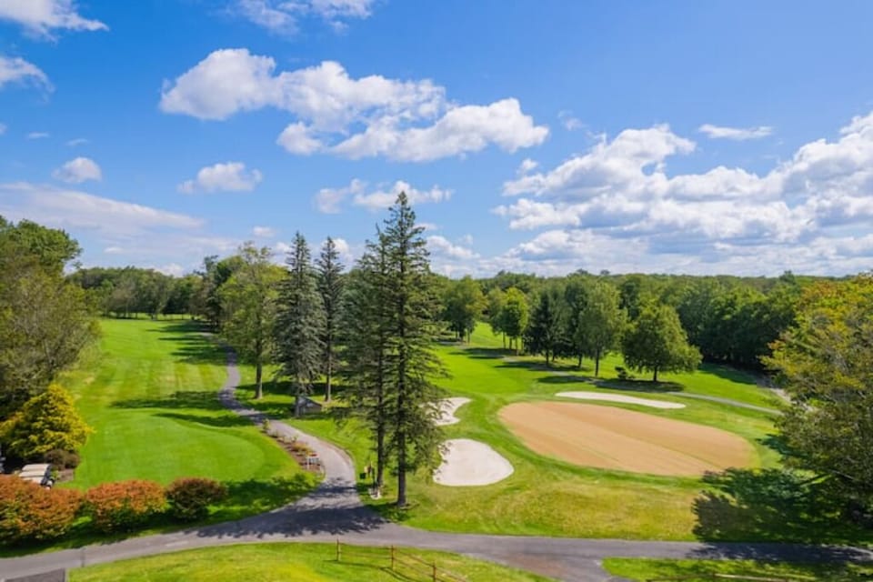 Breathe in the fresh air and tee off with lake views and tree-lined fairways