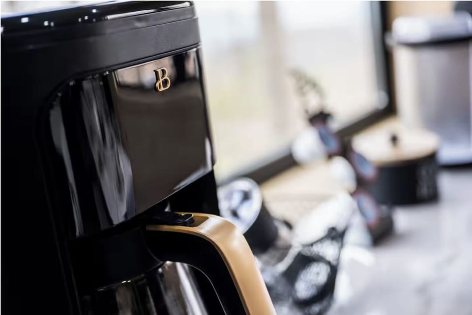 The kitchen offers both a drip coffee maker and a Keurig.