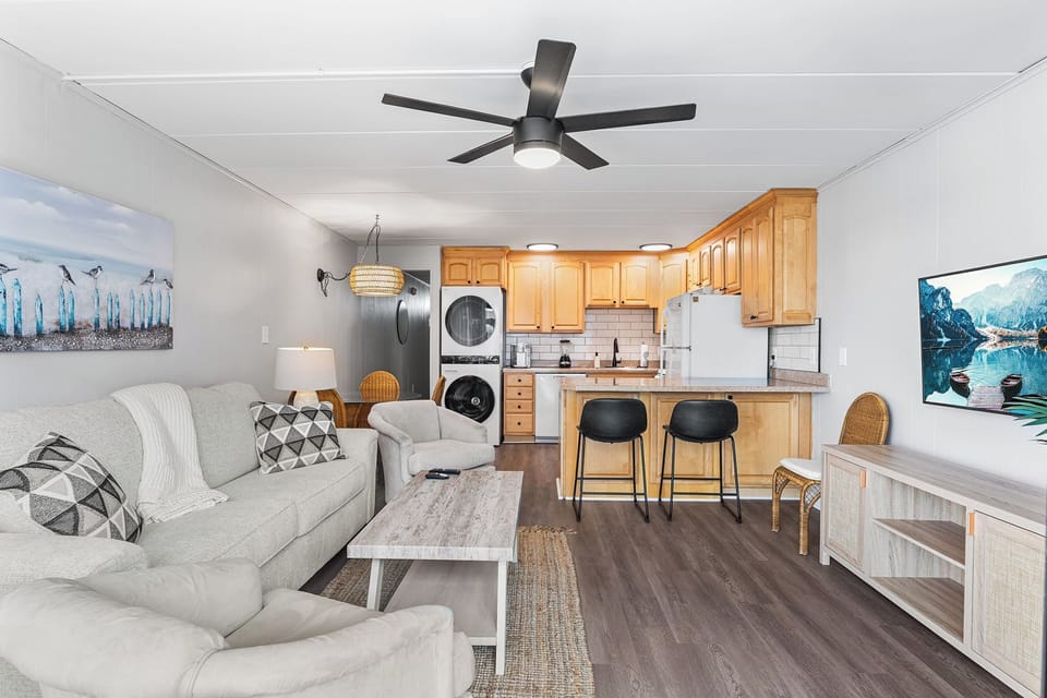 Smart layout with in-unit laundry, fans, and natural light throughout.