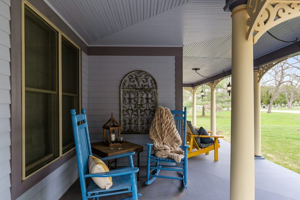Slow down and soak it all in—rocking chairs on the front porch invite you to relax, sip your favorite drink, and watch the world go by.
