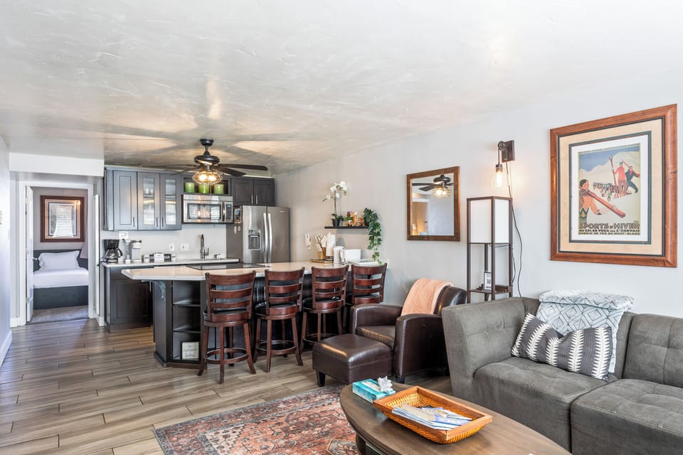 - Spacious open kitchen with stainless steel appliances  
- Breakfast bar seating perfect for family gatherings  
- Modern vacation rental near Park City attractions
