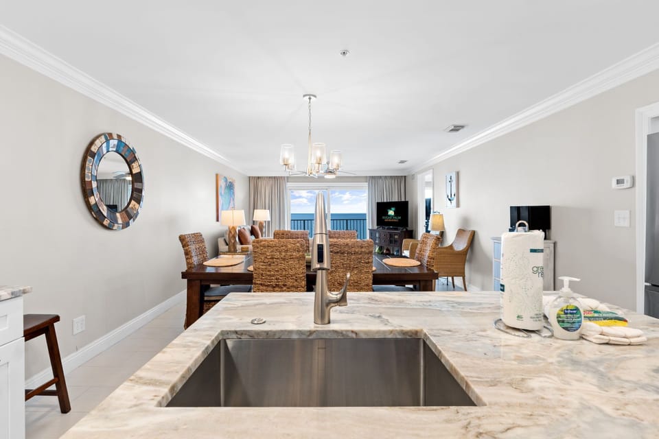 Beautiful new cabinets and countertop offer plenty of space for meal prep.