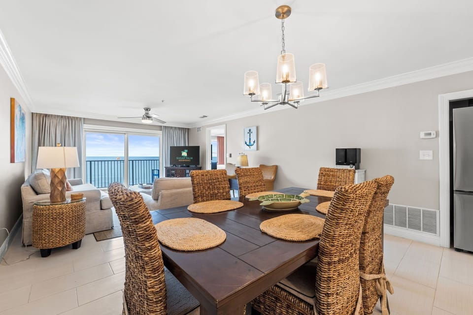 Seating for 6 at the table, and 3 more at the kitchen island.