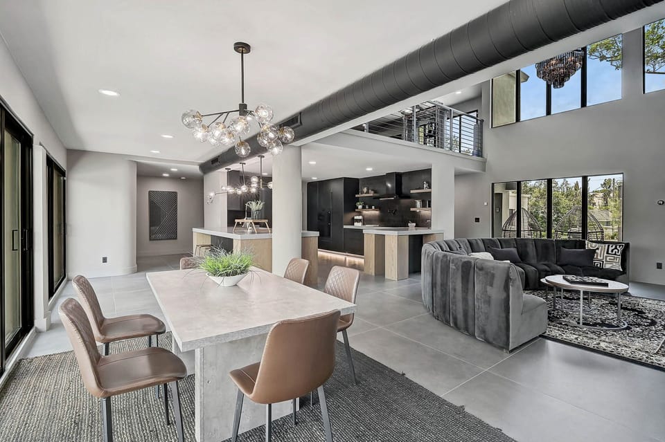 Bring everyone together in a beautifully lit dining space beside the kitchen.