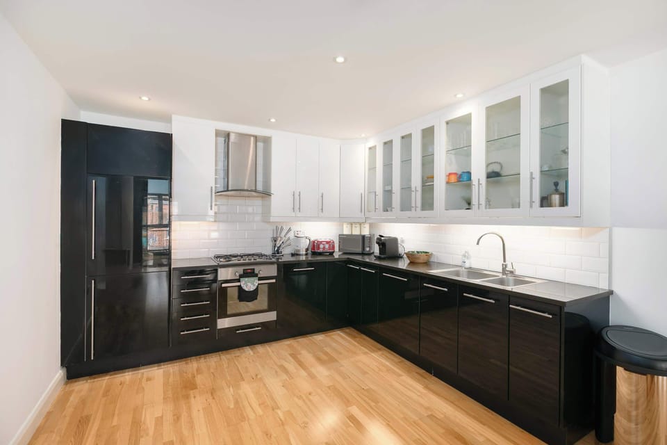 A beautifully designed, fully equipped kitchen with premium appliances and everything you need to prepare anything from a quick breakfast to a family feast