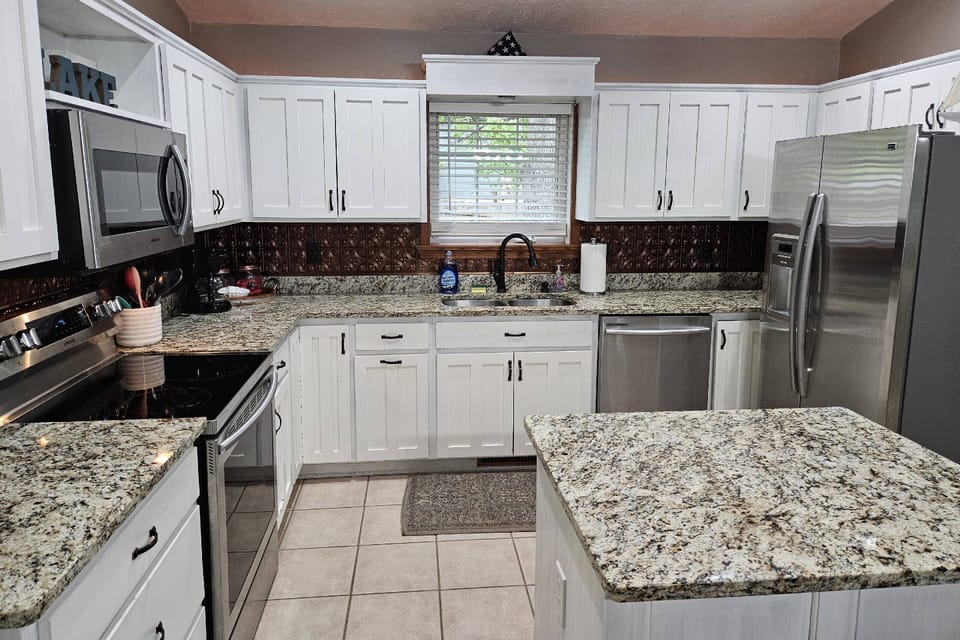 Fully Equipped Stainless Steel Kitchen.