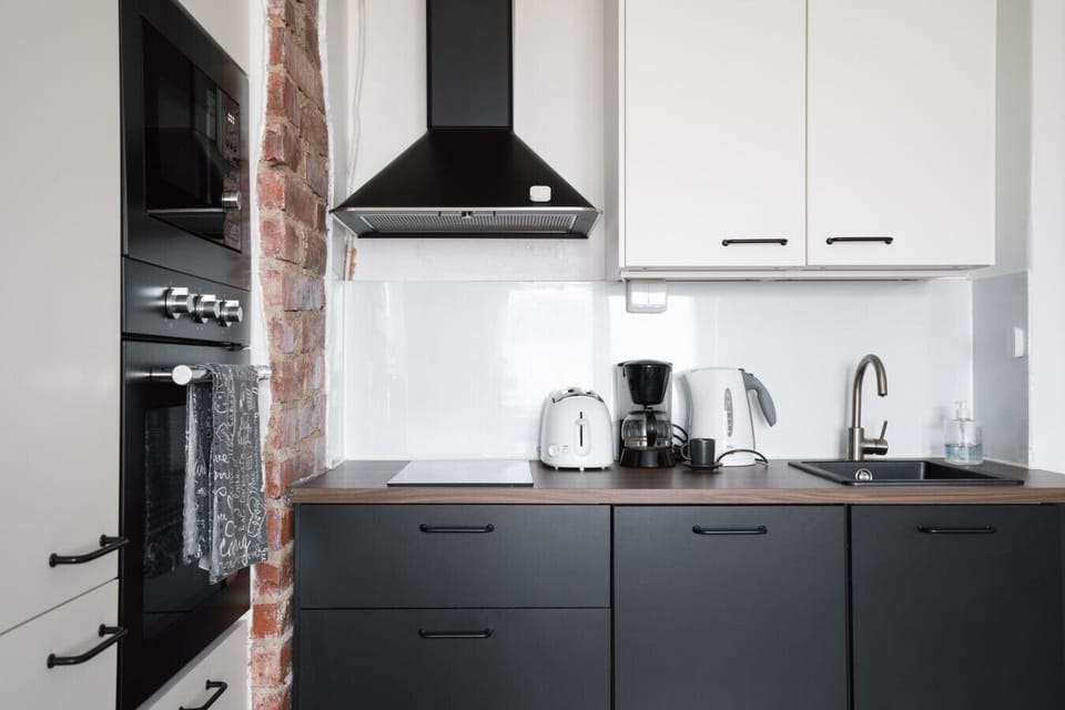 Enjoy cooking in a sleek, modern kitchen fully equipped with everything you need for home-cooked meals