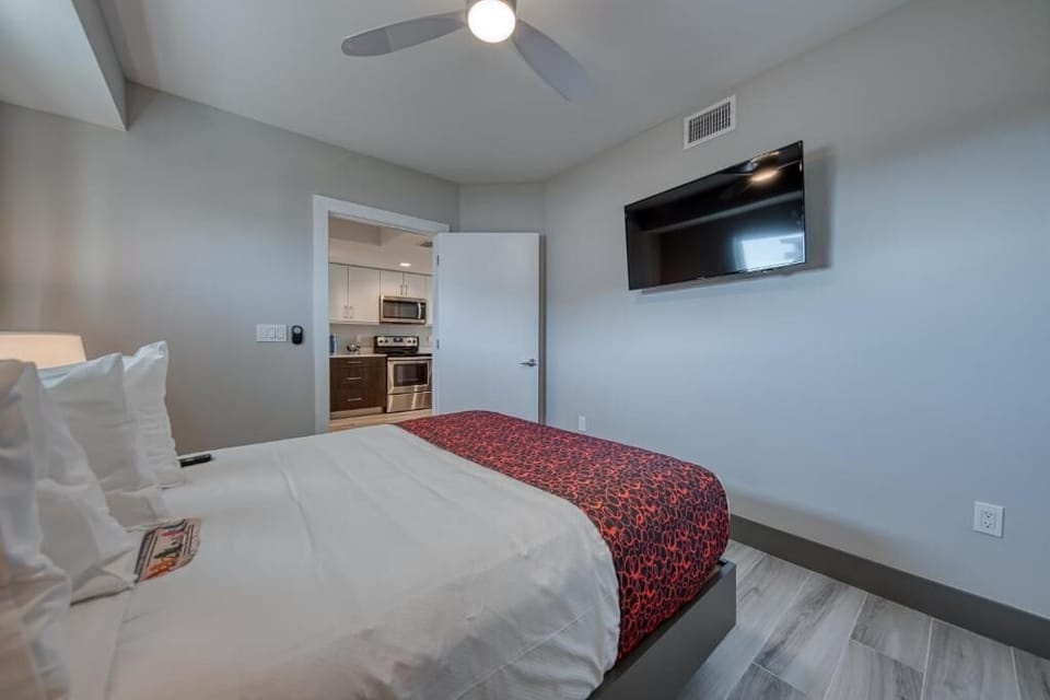 Recharge in a calm, airy room with modern comforts.
