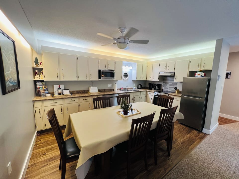 A full Kitchen with modern appliances, dining and open plan concept. You'll have everything you'll need to feed and entertain the crew.