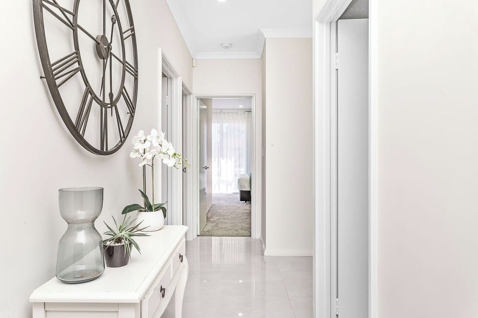 Walk in entrance. Hallway that connects bedrooms with living areas. 
