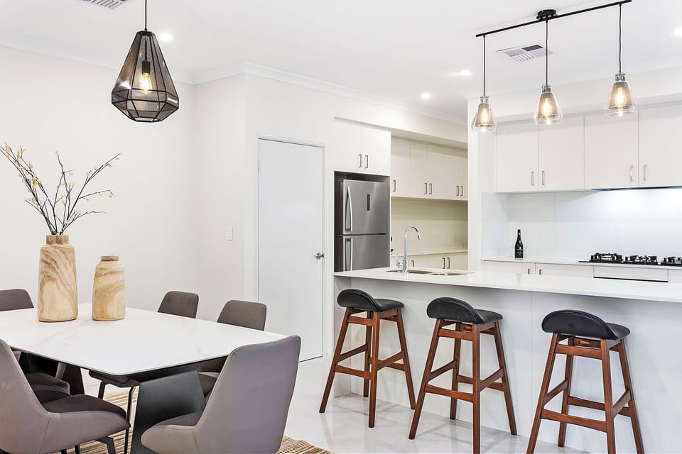 Dining and Kitchen area with kitchen bar stools