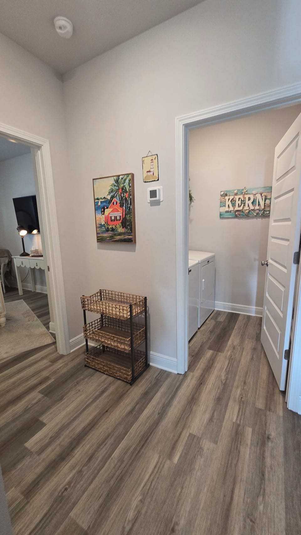 laundry facility next to the spare bedroom 