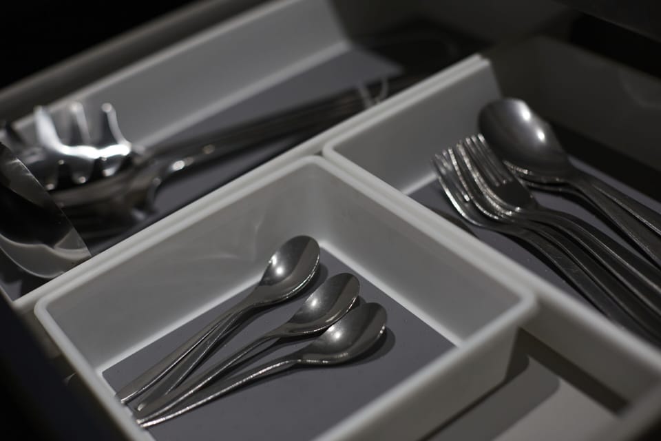 Well-appointed kitchen with essential appliances and ample workspace.