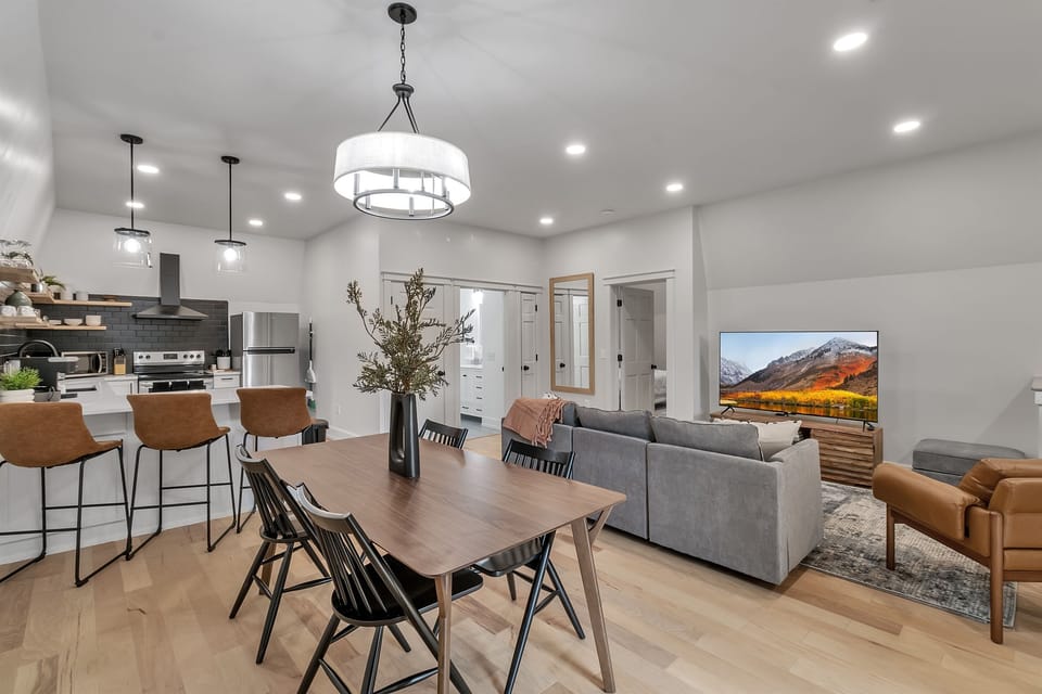 Open concept dining room flows easily into the kitchen and living room