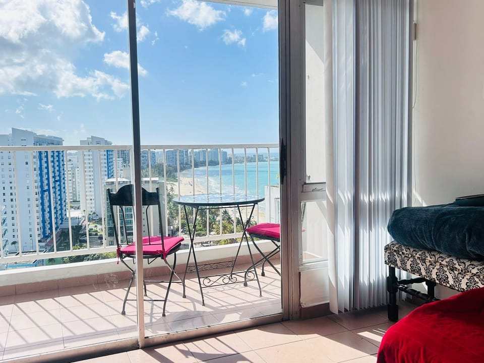 View of the beach from inside the apartment