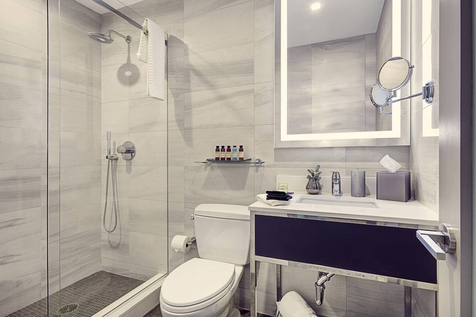 Refresh in a sleek walk-in shower with spa-like finishes.