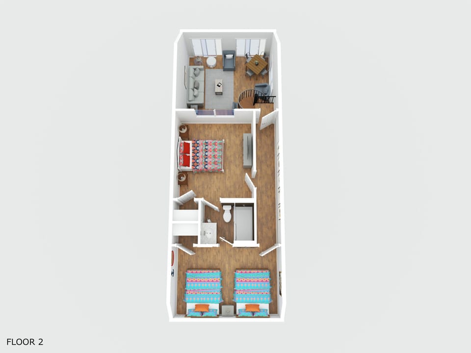 Second Floor: Two bedrooms — one with a king bed and one with two queen beds — both sharing a full bathroom.