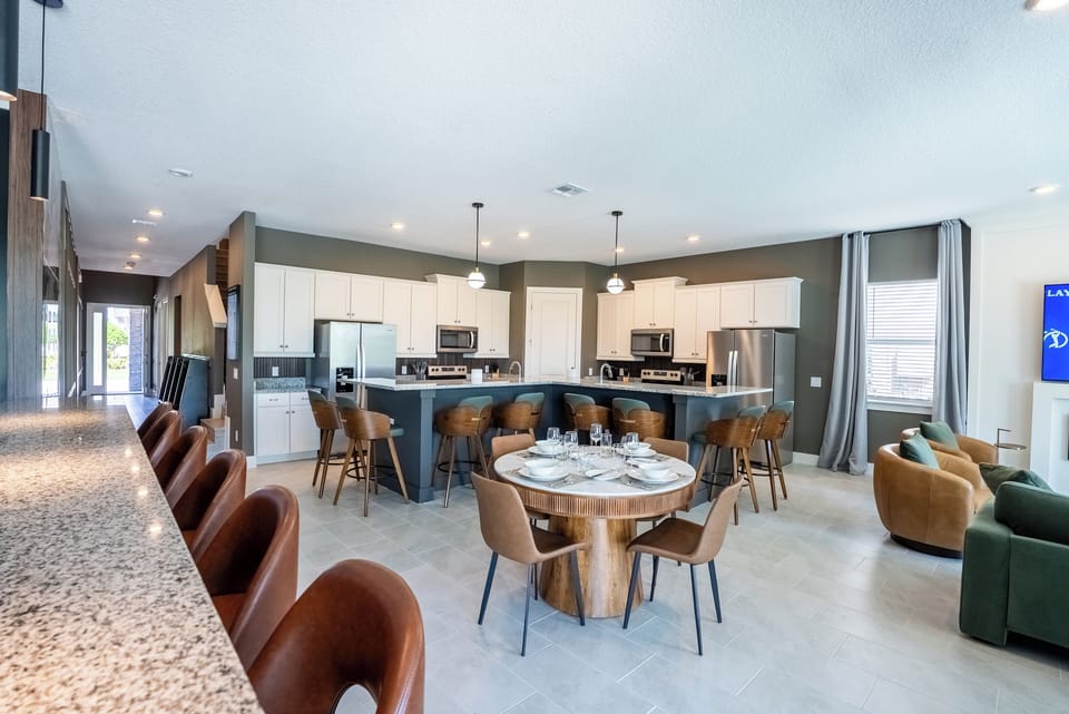 Chef’s kitchen with double ovens and oversized island