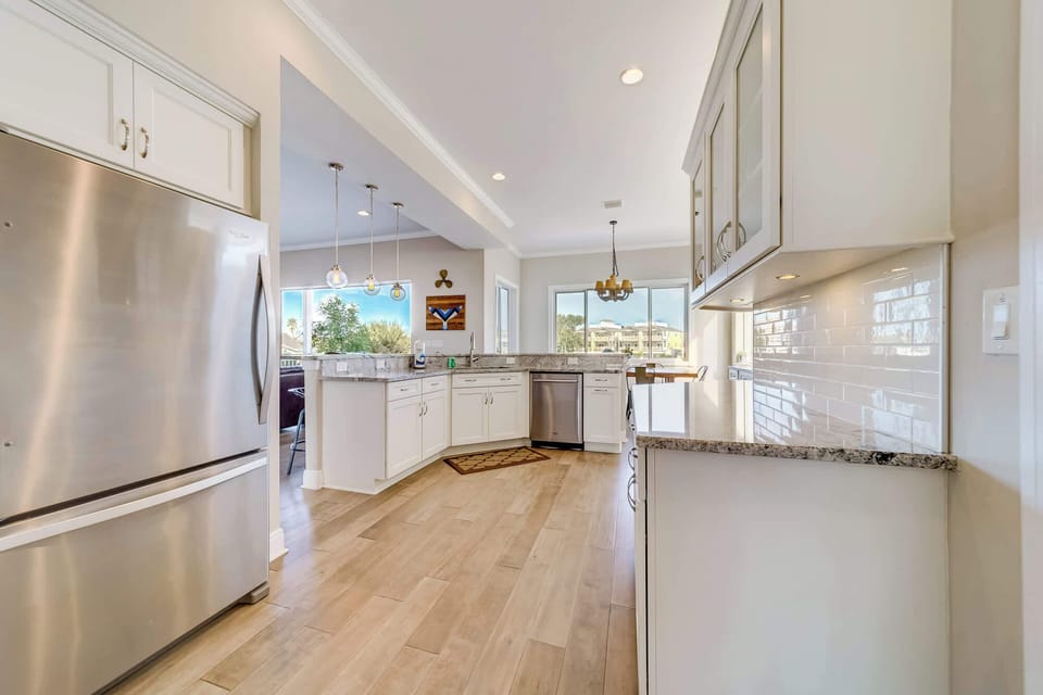 From gourmet meals to casual snacks—our kitchen with a large island and high-end appliances has everything you need.