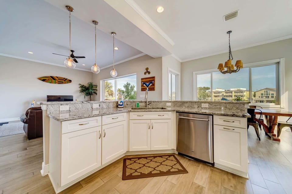 From gourmet meals to casual snacks—our kitchen with a large island and high-end appliances has everything you need.