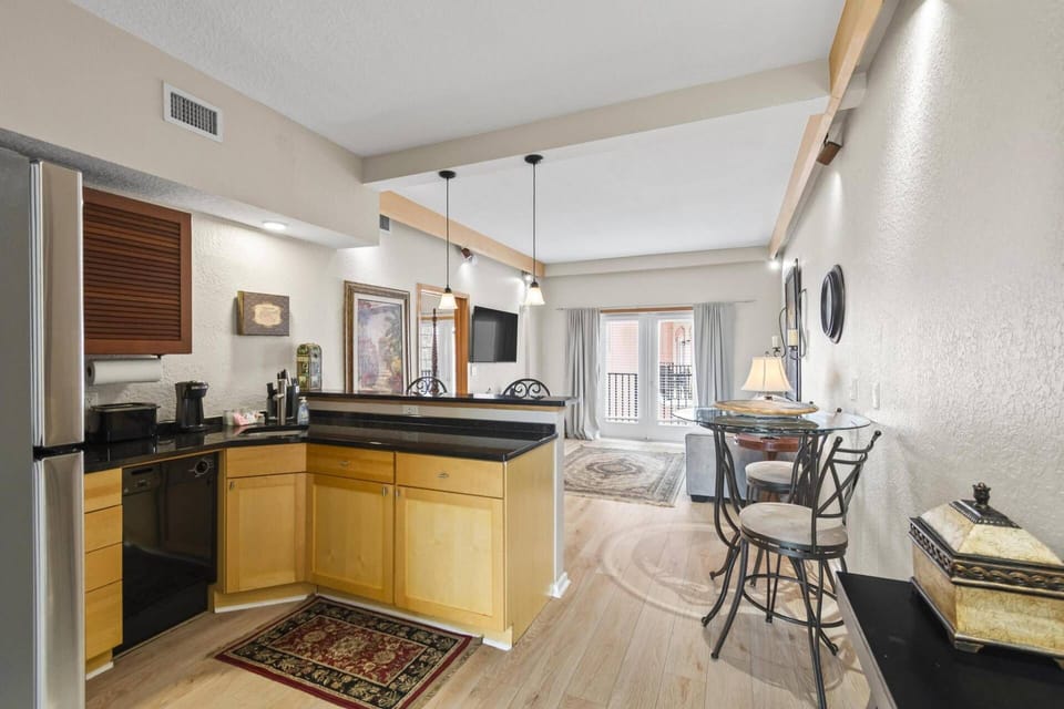 Functional kitchen with all the essentials, including cookware, utensils & appliances—perfect for preparing meals, please note there is no oven.