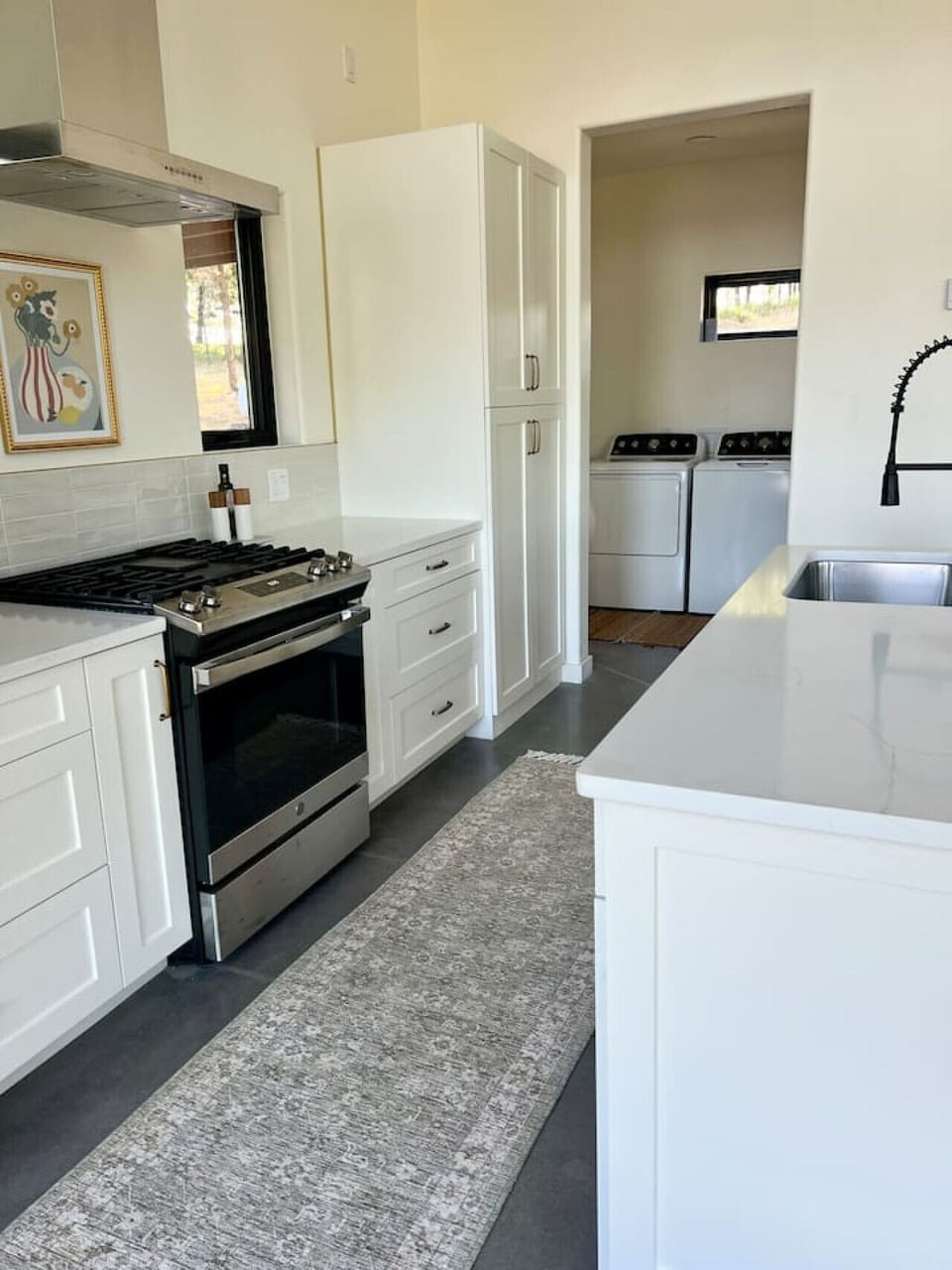 Kitchen with gas range and large island