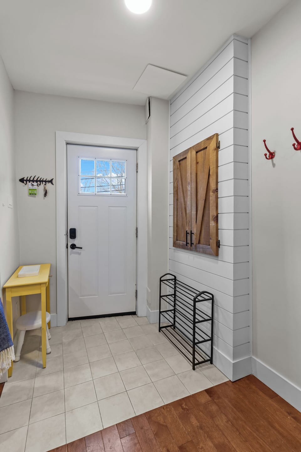 Welcome! Enter through the bright front door featuring a convenient smart lock.