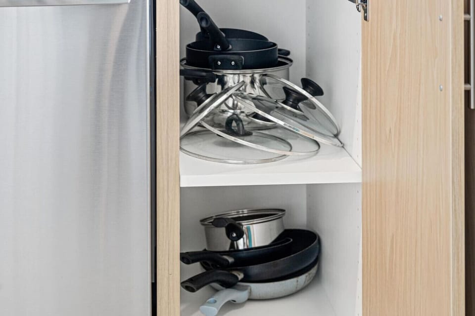 Fully equipped kitchen with all the tools you need for a perfect culinary experience. Enjoy the convenience of having everything at your fingertips!