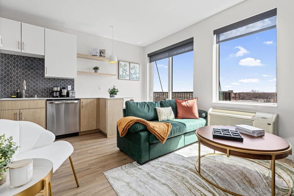 An open-concept area featuring a modern furnishings, and a stylish entertainment setup—ideal for gatherings and relaxation.