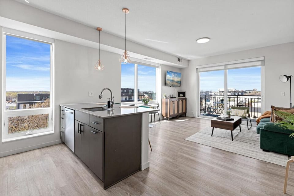 An open-concept area featuring a modern furnishings, and a stylish entertainment setup—ideal for gatherings and relaxation.