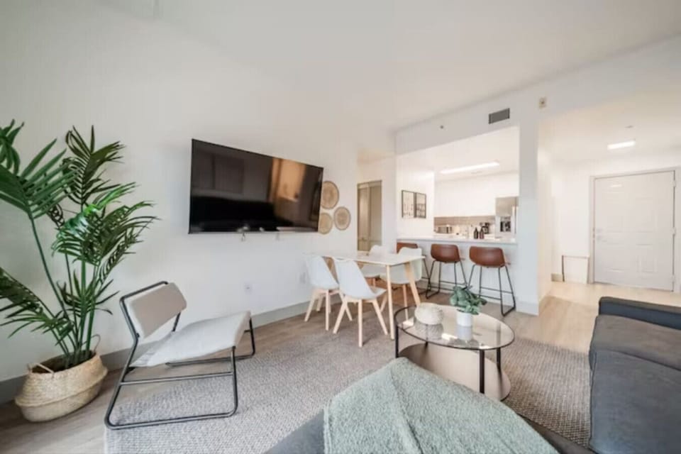 As you take a seat in the living room, the comfortable furniture and tasteful design make it easy to unwind.