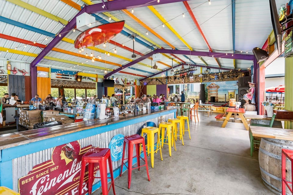 Kick back at the colorful Rock Island Tiki Bar! Enjoy tropical cocktails, casual bites, and live summer music — all just steps from the lake and pool. The ultimate hangout for unforgettable Branson nights!