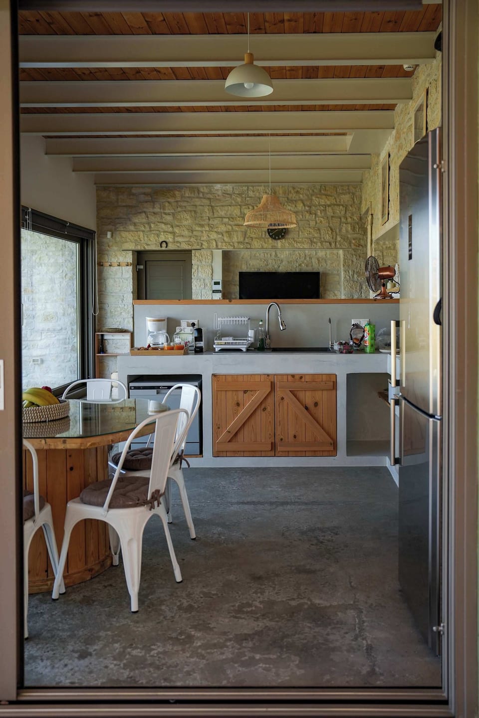 Fully equipped kitchen with modern amenities and a cozy vibe.