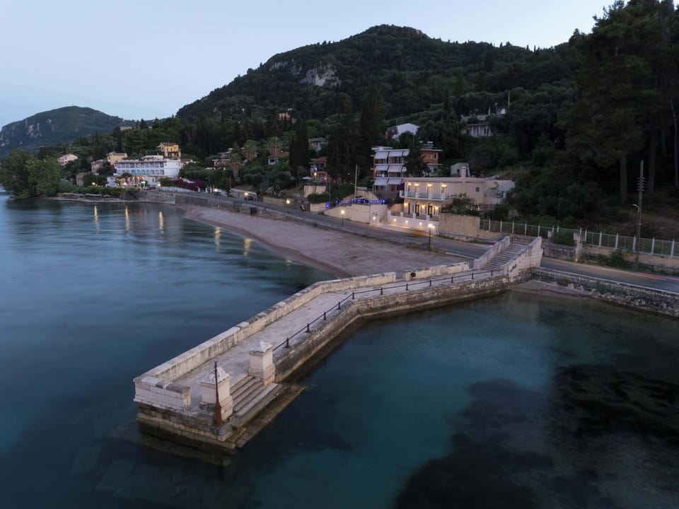 Villa by Moonlight – Enchanting Waterfront Glow

