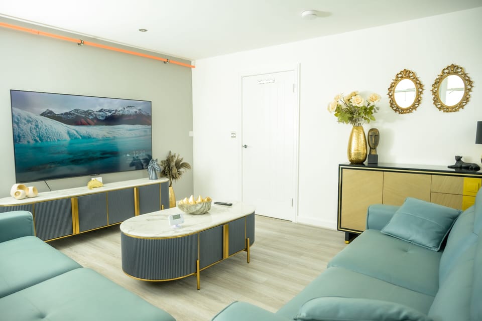 Relax in this comfortable living room, perfect for unwinding after a busy day.