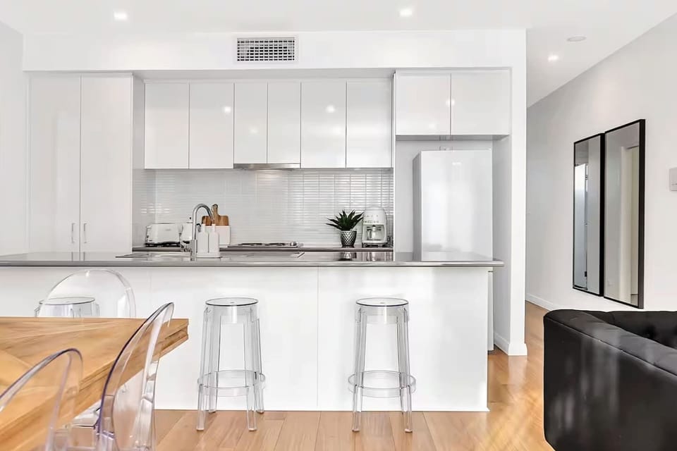 Whip up meals effortlessly in the fully equipped kitchen, complete with plenty of bench space and a breakfast bar.
