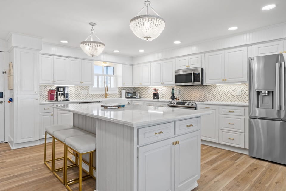 The island doubles as a serving station or casual dining spot, ideal for gathering with friends and family.