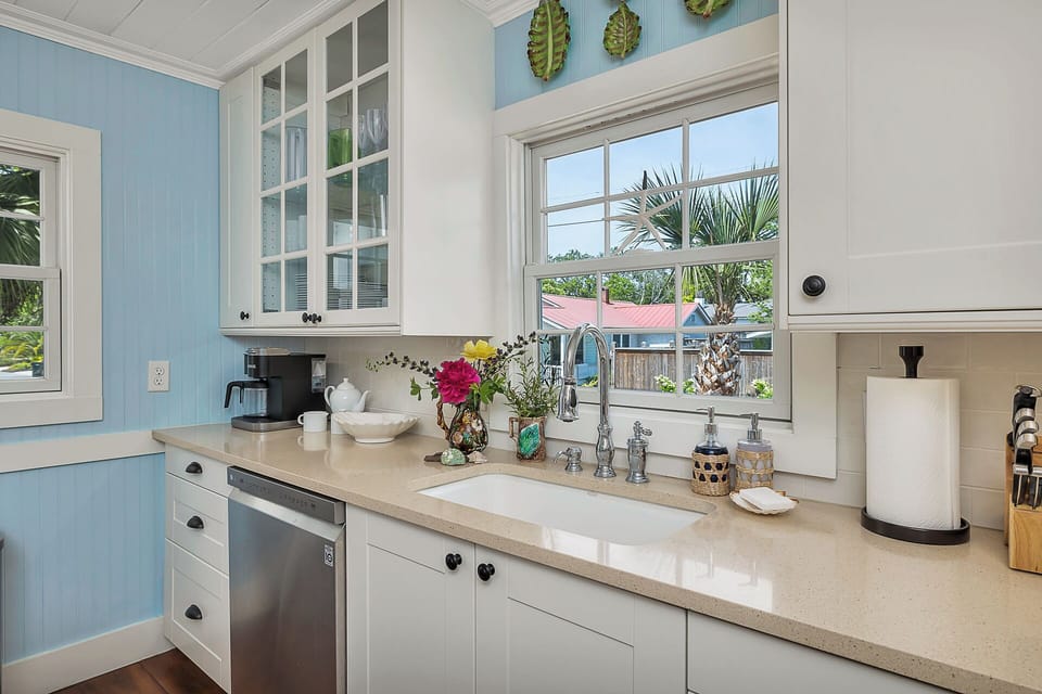 The fully stocked kitchen with brand new dishes, flatware and cooking ware