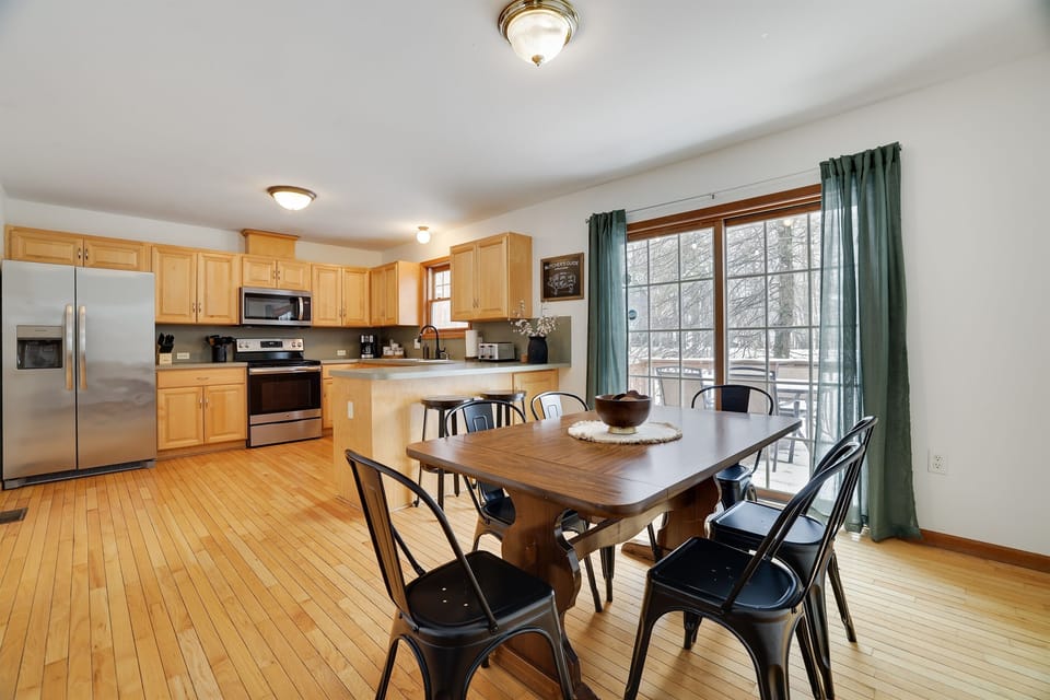 Spacious dining area perfect for shared meals, game nights, or gathering with loved ones.