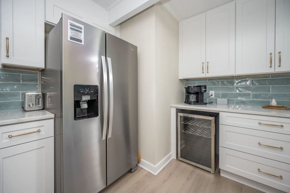 Cook with ease in this complete kitchen setup, designed for both comfort and function.