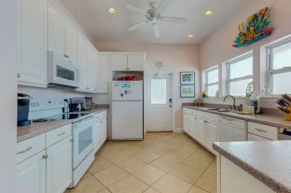 Full kitchen with TWO ice makers and all the conveniences.