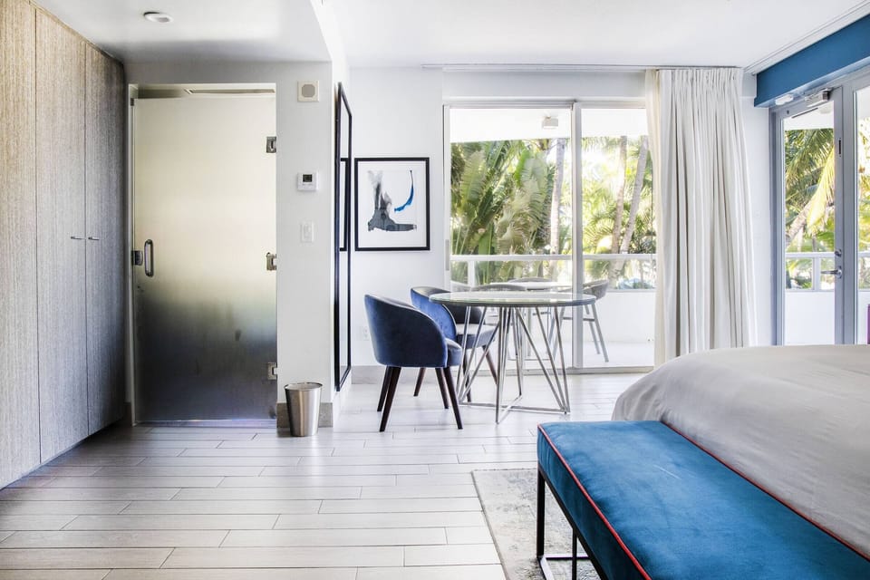 Sip coffee by the window while palms sway outside.