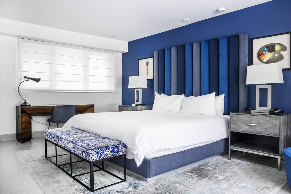 Settle in with a dedicated desk and calming, modern comforts.