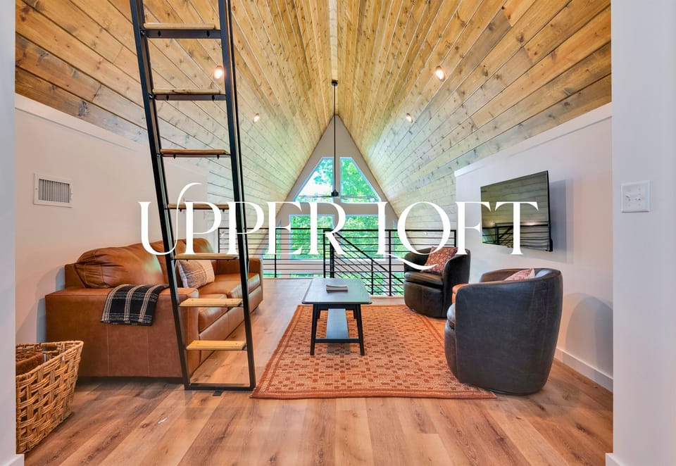 The upper loft is a fun bonus space for games, reading, or just lounging with a different view of the cabin.